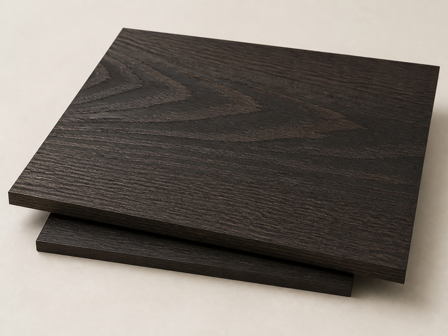 Deep charcoal-brown stained ash veneer panels with bold open grain